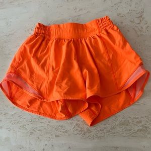 Orange lululemon hotty hot shorts